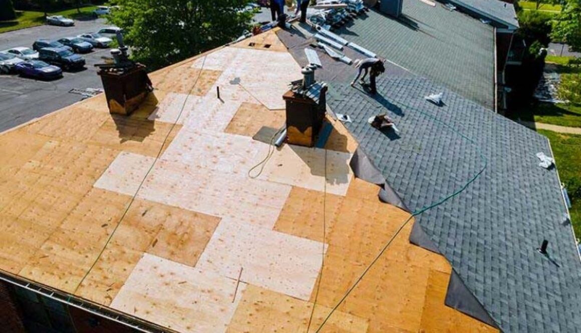 A roof being replaced on an apartment building