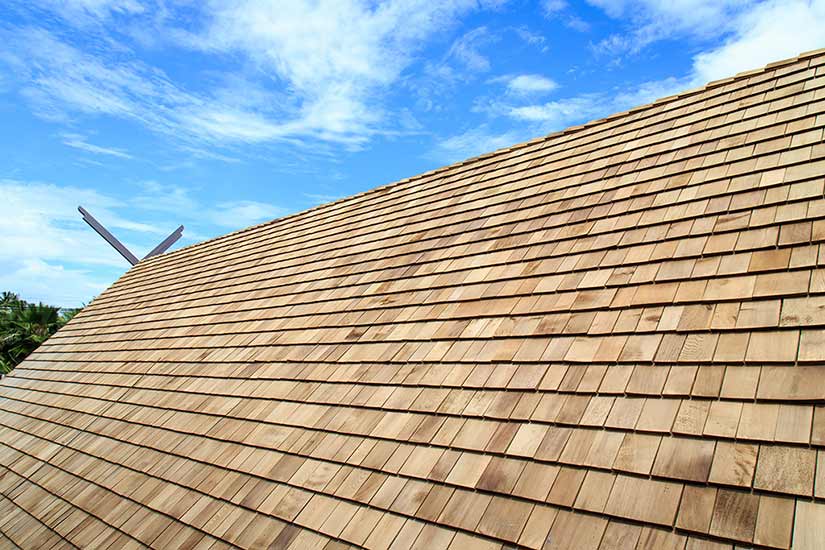 Wooden shingles on a roof.